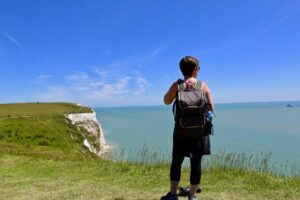 Woman Standing By Dover Cliffs