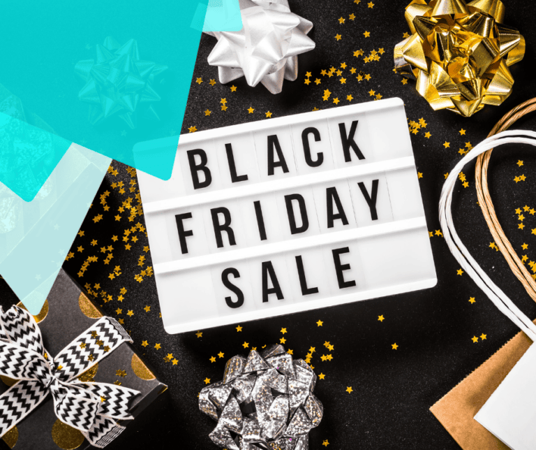Black Friday Sale sign with Christmas gifts surrounding it.
